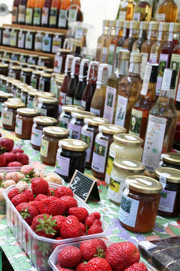 Jams and fruit on a market table in France
